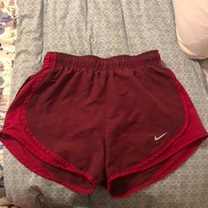 Red Nike shorts